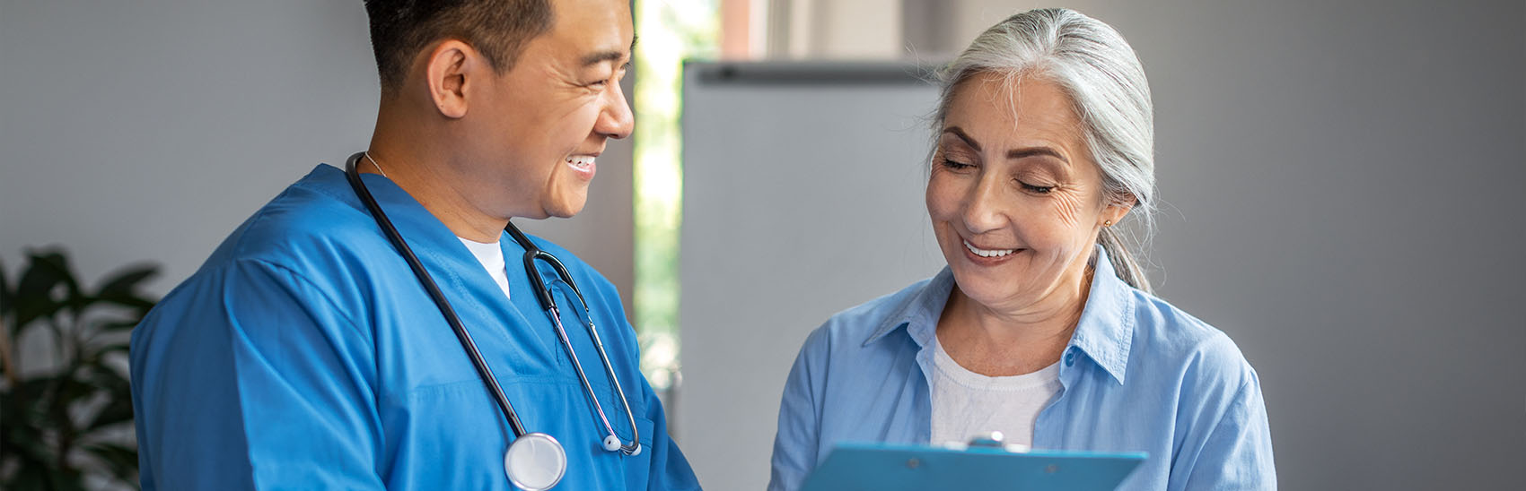 Doctor and patient during a pain management appointment.