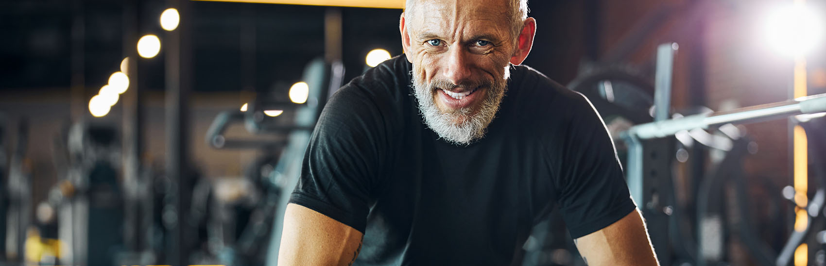 Healthy senior weightlifting for pain prevention.